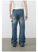Jean déchiré délavé micro-évasé pour homme, style rétro américain, coupe droite ample, pantalon en denim décontracté, ambiance bûcheron, tendance