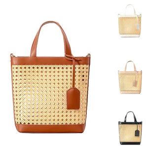 Spring <b>Summer</b> Winter Fashion Portable Handmade Straw Women's Beach <b>Handbag</b> with Hollow Out Design for Seaside Holiday - Product Image 1