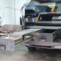 Cuisine extérieure coulissante ECOCALO 4x4 en acier inoxydable avec deux cuisinières, évier, tiroir de rangement et ailes latérales pour Nissan NP300