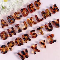 Perles en acrylique imprimé léopard ambre à gros trous pour la fabrication de bracelets de téléphone et de breloques de sac DIY Yiwu