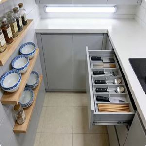 Meuble double usage qui sert de table d'appoint et de rangement, idéal pour les studios et les petits salons - Product Image 3