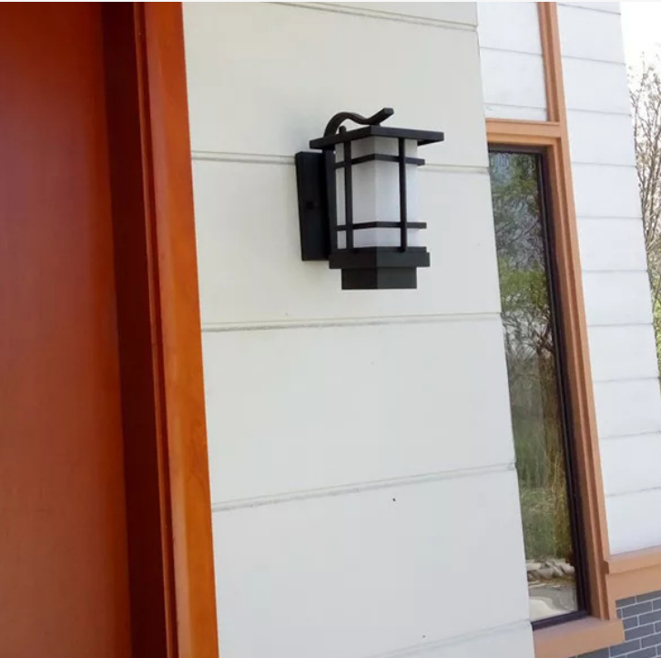 Nueva lámpara de pared exterior china simple moderna creativa lámpara de patio pasillo impermeable pared exterior balcón lámpara de pared fabricante