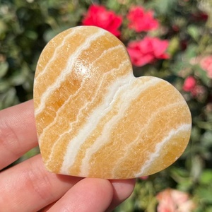 Vente en gros de pierres de palmier en calcite orange naturelle polie de haute qualité pour la décoration de la maison, l'art et les objets de collection - Product Image 2