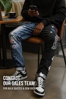 Pantalon en jean asymétrique homme streetwear bleu et noir bicolore, déchiré et vieilli, motif graffiti intégral