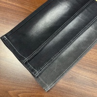 Tissu denim extensible en sergé teint en fil Lizhi XH6082WA, coton lyocell 69*52, noir, en rouleau, pour sacs garçons et filles