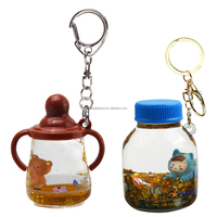 Nouveau design créatif mignon, porte-clés en acrylique en forme de biberon de dessin animé avec flotteur 3D, vente en gros, OEM ODM disponible, cadeau souvenir