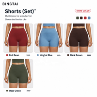 Ensemble de sport pour femme à col rond et bordure contrastante, comprenant un soutien-gorge de sport à bretelles spaghetti et dos croisé, et un short cycliste taille haute effet push-up, séchage rapide, pour le yoga