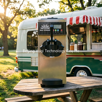 Machine à glace molle commerciale grise avec réservoir de mélange de 2,5 L, compatible avec diverses saveurs de crème glacée molle, facile à utiliser.