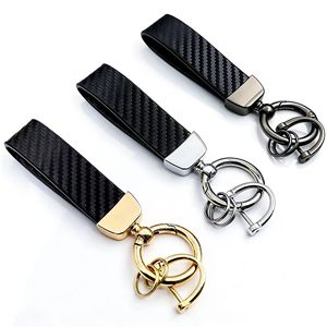 Porte-clés de <span class=keywords><strong>voiture</strong></span> haut de gamme - Porte-clés en métal texturé en fibre de carbone tendance avec logo - Cadeau personnalisé très demandé - Product Image 1