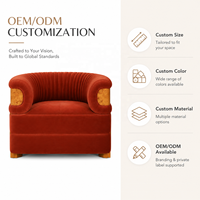 Fauteuil en velours orange brûlé avec accents en bois de burl et capitonnage cannelé pour salon