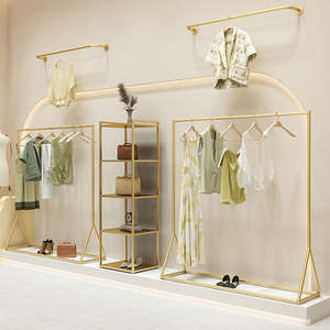 Moderno Exhibidor de Ropa Metálico Dorado, Soporte de Pared para Colgar Ropa, Estantes de Exhibición para Tiendas de Ropa - Product Image 2
