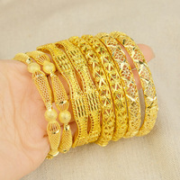 Ensemble de bracelets en cuivre doré orné de filigranes exotiques pour femmes, bijoux bohèmes, bijoux bohèmes modernes