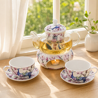 Service à thé en verre avec motif floral paon, chauffe-thé, infuseur, 2 tasses et soucoupes en porcelaine, chauffe-bougie, logo personnalisé, vente en gros