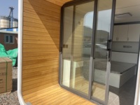 Structure en acier préfabriquée innovante de 10 pieds Sauna Board Terrace Barndominium Apple Cabin Mini Green Houses for Villa Living