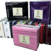 En stock : Ensemble de literie 4 pièces en polyester, couleur unie (bleu foncé, gris, noir), finition lavée et poncée, comprenant drap-housse et housse de couette.