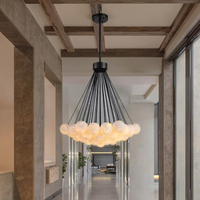 Lustre boule d'albâtre au design moderne ECOJAS Éclairage élégant pour la décoration d'un hôtel de villa Comprend l'installation de lampes suspendues