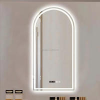 Miroir intelligent mural en verre cintré avec LED et interrupteur tactile pour salle de bain