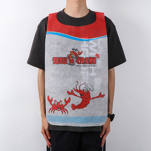 ผ้ากันเปื้อนแบบใช้แล้วทิ้งสำหรับลูกค้าร้านอาหาร ผ้ากันเปื้อนบาร์บีคิวเกาหลีแบบไม่ถักทอ สามารถพิมพ์โลโก้ได้ - Product Image 1