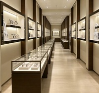Comptoir d'exposition de luxe pour bijoux/montres avec éclairage LED, vitrine en verre haut de gamme pour la vente au détail haut de gamme