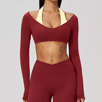 Haut de sport pour femme à col halter, effet deux pièces, manches longues, rembourré, col en V, très élastique, coupe courte, pour Pilates, gym et course à pied