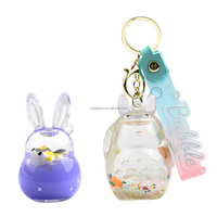 Nouveau design créatif et mignon, porte-clés en acrylique liquide Totoro en gros avec flotteur 3D, OEM ODM disponible, cadeau souvenir