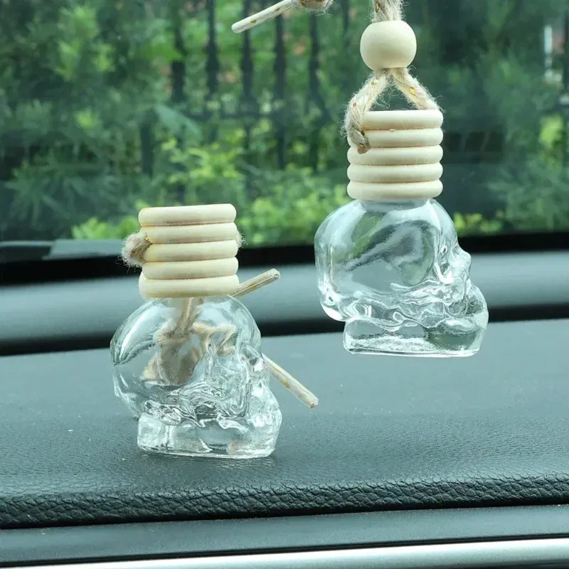 Aroma Diffuser 5ml 8ml Skull Shape fragrance bottle diffuser glass car air freshener hanging perfume bottle with wooden