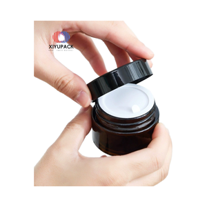 ขวดแก้วสีชาขนาด 30 <span class=keywords><strong>ม</strong></span>ล. 50 กรัม สำหรับเครื่องสำอาง ฝาพลาสติกสีดำ ปากกว้าง ผนังหนา พิ<span class=keywords><strong>ม</strong></span>พ์ลาย สำหรับบรรจุน้ำ<span class=keywords><strong>ม</strong></span>ันใส่ผ<span class=keywords><strong>ม</strong></span> <span class=keywords><strong>เซ</strong></span><span class=keywords><strong>รั่</strong></span><span class=keywords><strong>ม</strong></span>บำรุงผิว - Product Image 4