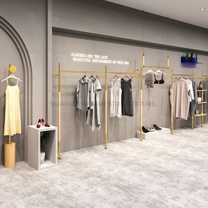 Gli scaffali dorati della <span class=keywords><strong>parete</strong></span> dell'esposizione dello scaffale di esposizione dei vestiti fissato al muro della Boutique appendono l'acciaio inossidabile per il negozio di abbigliamento - Product Image 4