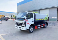 Camion à ordures compacteur Dongfeng 4x2 diesel à boîte de vitesses manuelle et chargement latéral, véhicule professionnel de transfert de déchets pour hôtels