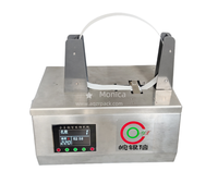 Machine automatique de cerclage de cartons avec bande adhésive, thermoscellante, pour l'emballage manuel des boîtes