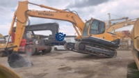 Excavatrice Hyundai 215-9T d'occasion de haute qualité, en excellent état, avec un excellent montacarga Heli a Glp Usado