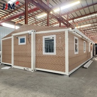 Maison préfabriquée de luxe à mur bleu JJM Australie Standard 20 pieds 30 pieds 40 pieds Conteneur extensible Maison Pliable Immeuble de bureaux en acier