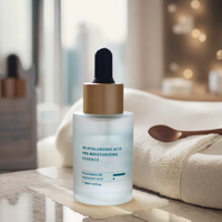 Sérum pour le visage à l'acide hyaluronique hydratant de marque privée OEM ensemble de soins de la peau pure et non grasse pour la réparation du visage sous forme de liquide blanchissant
