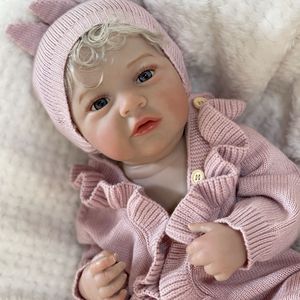 OtardDolls Poupée Reborn en vinyle de 45 cm avec cheveux blonds et tenue en tricot rose pour collectionneurs et cadeaux - Product Image 2