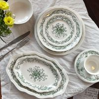 Service de vaisselle en céramique vert olive vintage français, motif floral en relief, compatible micro-ondes, assiette, bol, tasse, soucoupe, design circulaire