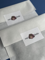 Autocollants en papier autocollants imprimés sur mesure avec impression numérique couleur pour l'emballage de vêtements et de marques de prêt-à-porter