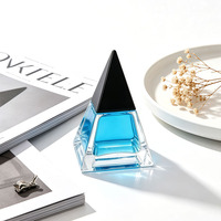 Flacon de parfum en cristal de luxe, design d'usine OEM, vaporisateur fin, 30 ml, 50 ml, 100 ml, flacon de parfum en verre, forme triangulaire