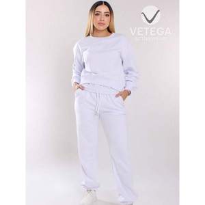 ชุดเสื้อและกางเกงกีฬาสีพื้นสำหรับผู้หญิงจากเวเทกา - Product Image 5