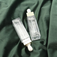 Fabricant de flacon compte-gouttes carré de 30ml flacon en verre d'huile essentielle de 1oz flacon d'essence vide transparent à fond épais