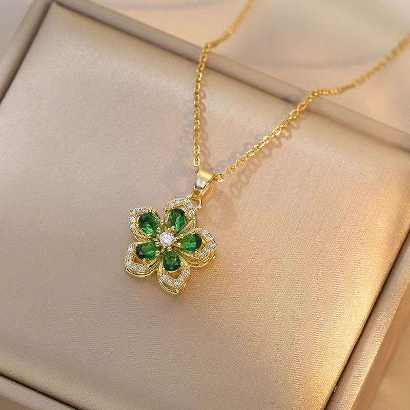 Emerald rotating necklace