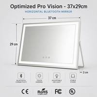 Miroir de maquillage LED en bois cintrée avec haut-parleur Bluetooth, 3 couleurs réglables, commande tactile, miroir de vanité OEM ODM en gros