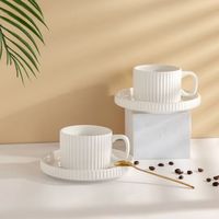 Tasse et soucoupe en céramique blanche mate de style nordique, de luxe, à prix abordable, fabriquées en usine, pour café et lait