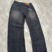 Jean rétro personnalisé pour hommes Pantalon en denim avec strass brillant avec étiquette de patch de mode vintage en détresse Conception de jambe droite et jambe large
