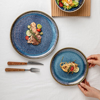 Ensemble de vaisselle en céramique de 12 pièces de style américain de luxe en gros d'usine vaisselle en porcelaine de glaçure réactive irrégulière bleue pour la maison