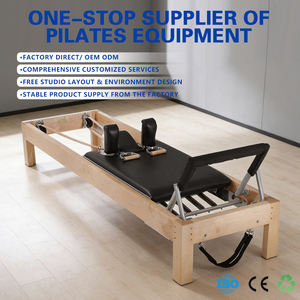Hoge kwaliteit JUNYIRUN JYR-CR01 klassieke Pilates Cadillac stoel reformer fitnessapparaat met eikenhouten bed voor bodybuilding - Product Image 1