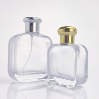Flacons de parfum en verre vides personnalisés 50ml 100ml Contenants transparents rechargeables avec pulvérisateur Impression couleur Emballage de parfum OEM ODM