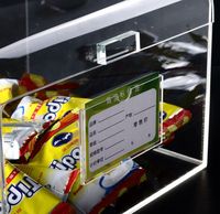 Boîte de rangement moderne en acrylique haute transparence pour la présentation d'aliments et de collations, idéale pour les comptoirs de supermarchés/centres commerciaux