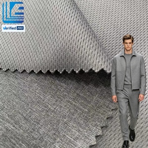 Tissu extensible 4 directions en nylon et polyester haute élasticité, tissu tricoté à l'œil de perdrix pour veste, manteau, vêtements d'extérieur - Product Image 1
