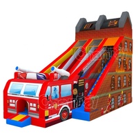 Château gonflable commercial à thème camion de pompiers avec toboggan à obstacles, parcours gonflable et toboggans secs