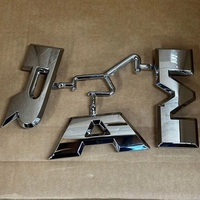 68247263AA OEM 2013-18 D ODGE RAM CALANDRE CHROME LETTRAGE « RAM»